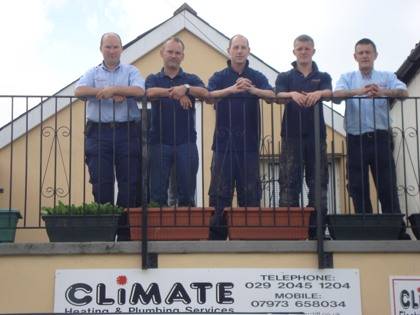 climate cardiff plumbers and heating engineers stood on balcony at climate house